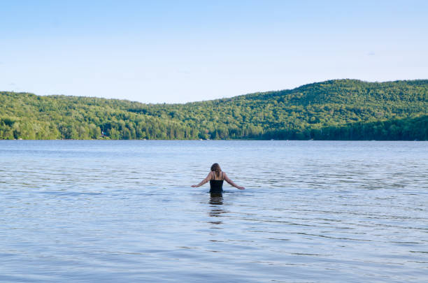 Woman in water going for a swim